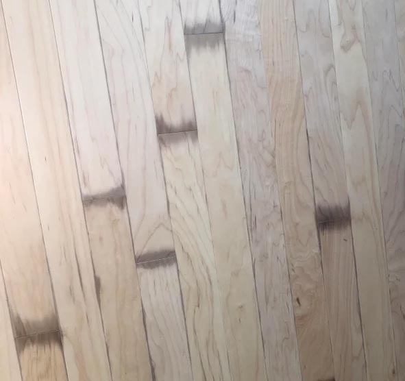 stains from sweat hardwood floor